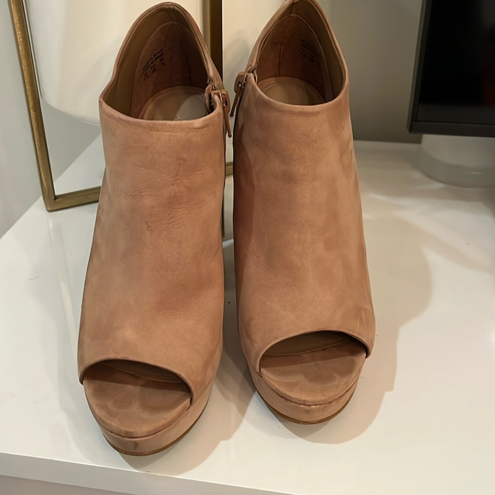 Tan Aldo peep toe heel platform booties. Some wear and tear.